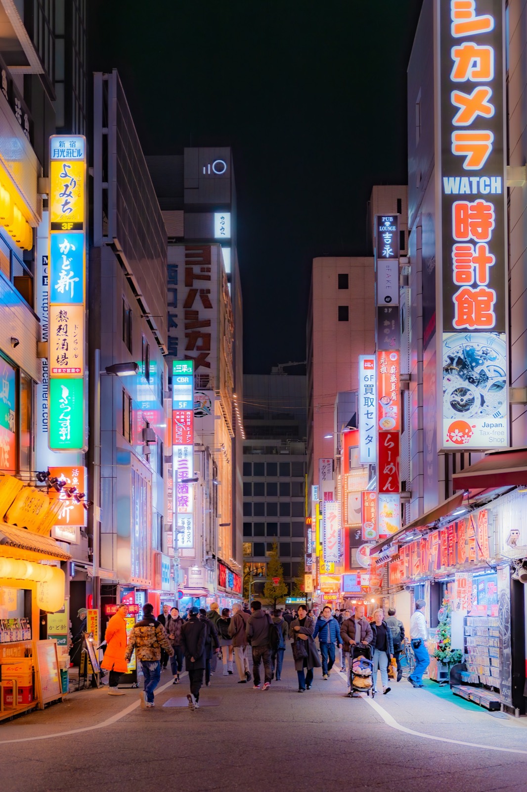 Busy Shinjuku street after dark